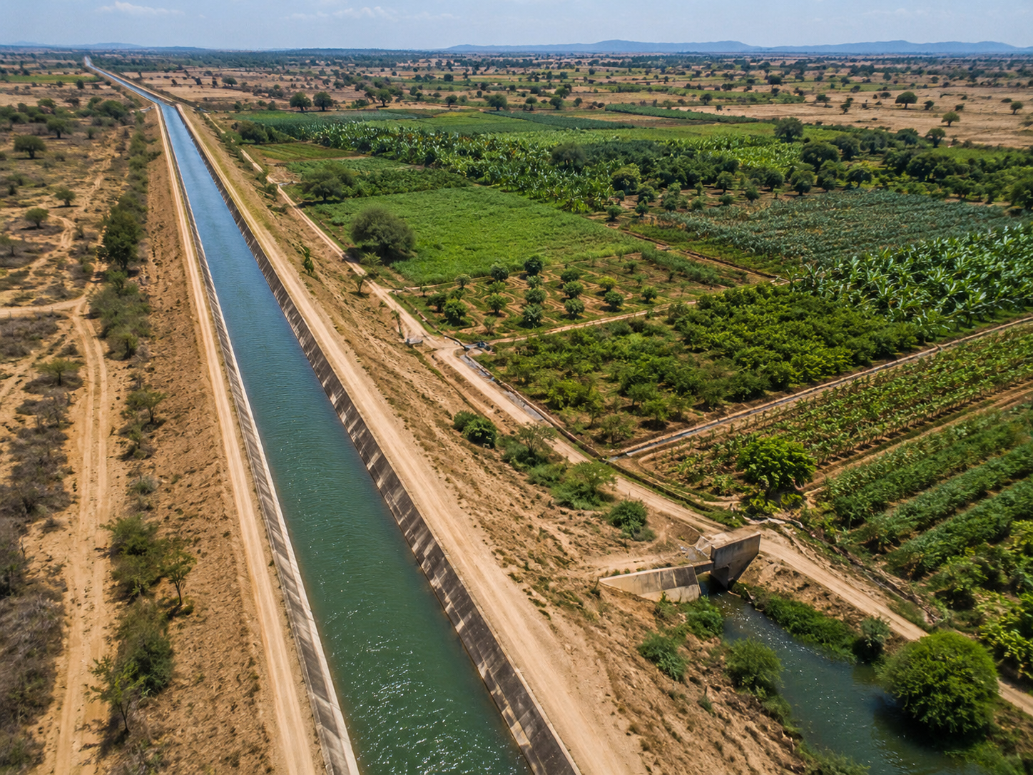 Main irrigation canal delivering water across the Bura / Galana-Kulalu agricultural landscape, showing how large-scale conveyance infrastructure supports crop production in Kenya’s dryland regions.