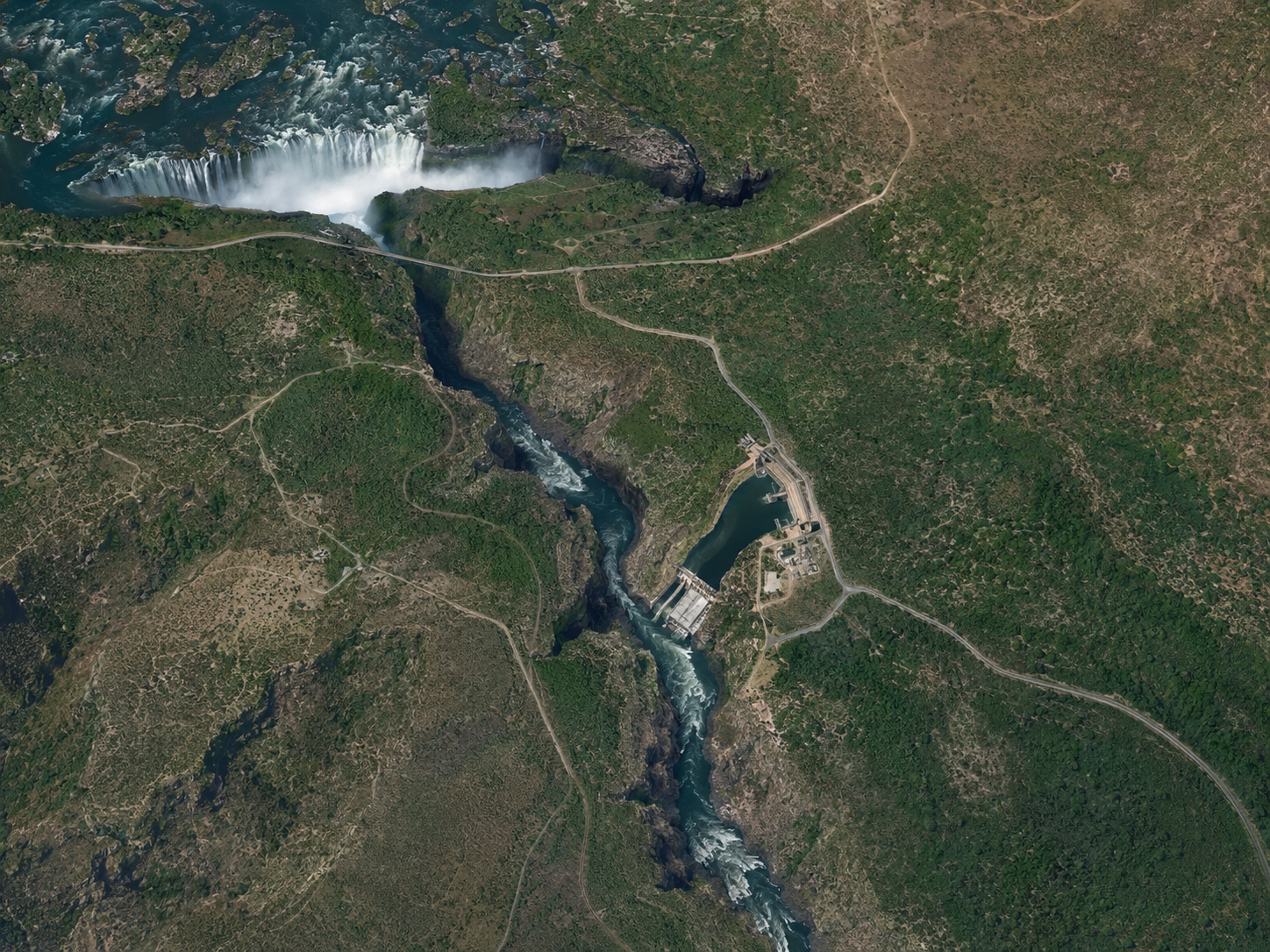 Satellite-style view of the Zambezi River corridor downstream of Victoria Falls, highlighting the gorge landscape and strategic project zone that make Batoka Gorge important for cross-border hydropower planning