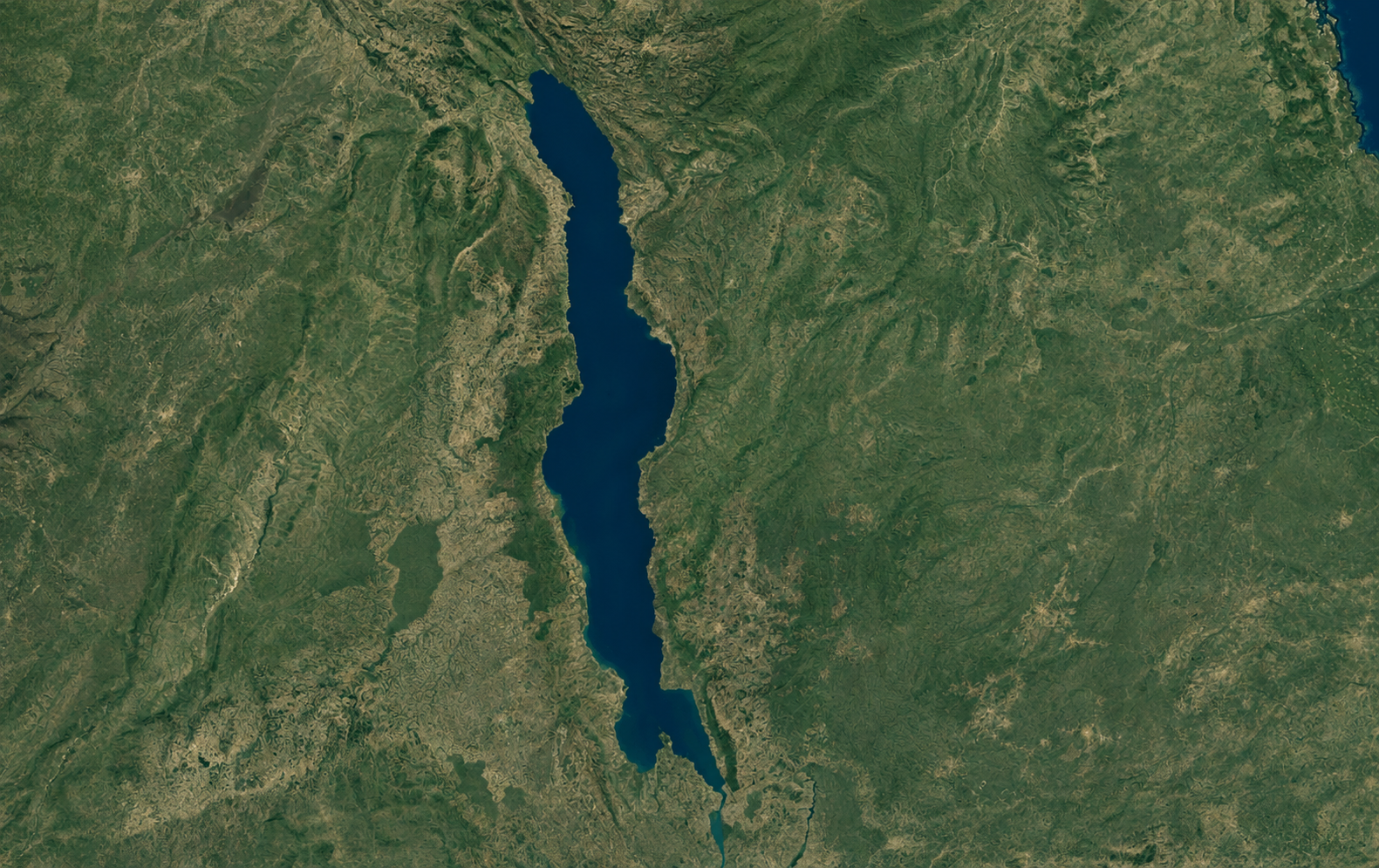 Clean satellite-style view of Lake Malawi and the Shire River corridor, showing the strategic river system that supports Malawi’s hydropower generation, water security, and the Mpatamanga Hydropower Storage Project.